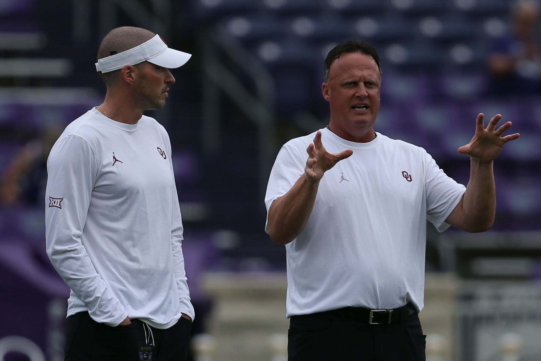 Alex Grinch and Cale Gundy